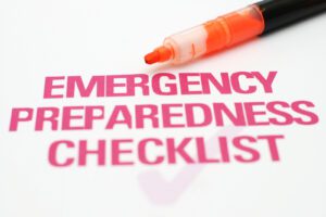 A pen laying on top of an emergency preparedness checklist.